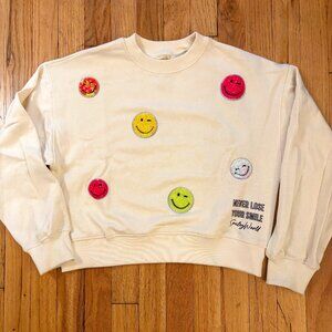 New, never worn Zara 'Smiley World' ivory sweatshirt with sequin smileys
